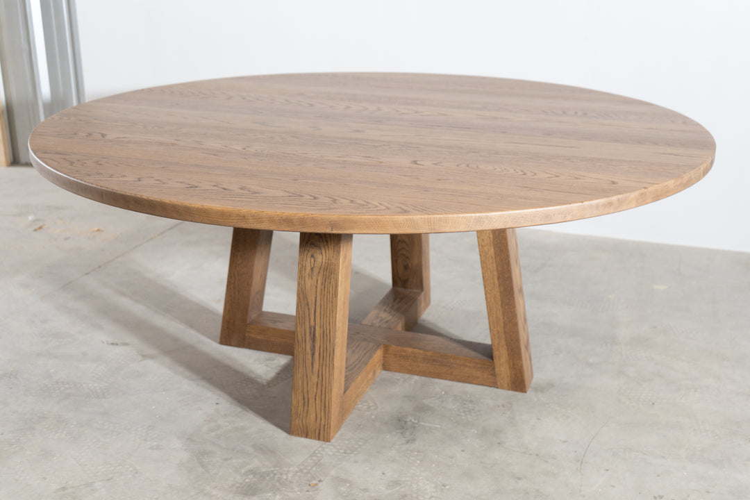 This stunning piece features a unique trapezoid pedestal base that not only offers exceptional stability but also adds a touch of modern artistry to any dining space. Crafted from the finest white oak, this table combines timeless beauty with contemporary design, making it the perfect centerpiece for high-end homes. Elevate your dining experience and impress your guests with this luxurious addition, ideal for those who appreciate the finer things in life.