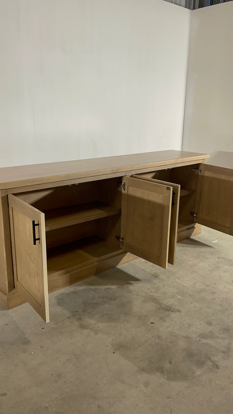 credenza with all the doors open to showcase the interior of the credenza