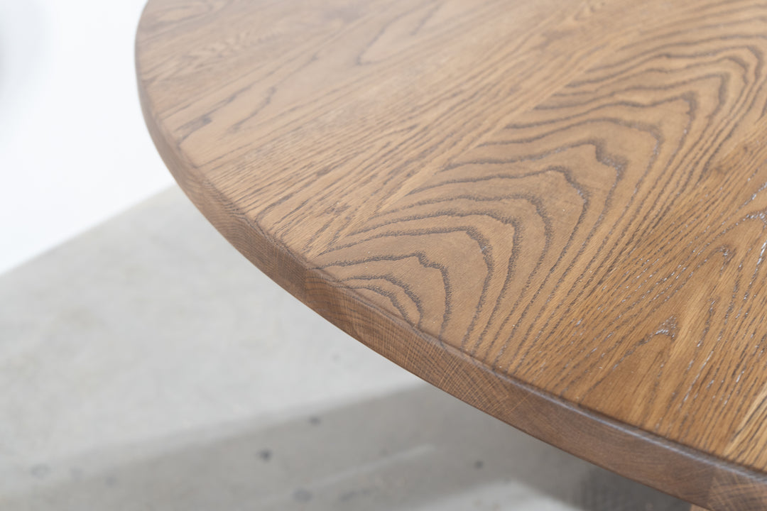 close-up of solid white oak tabletop with satin finish, showing wood grain and craftsmanship