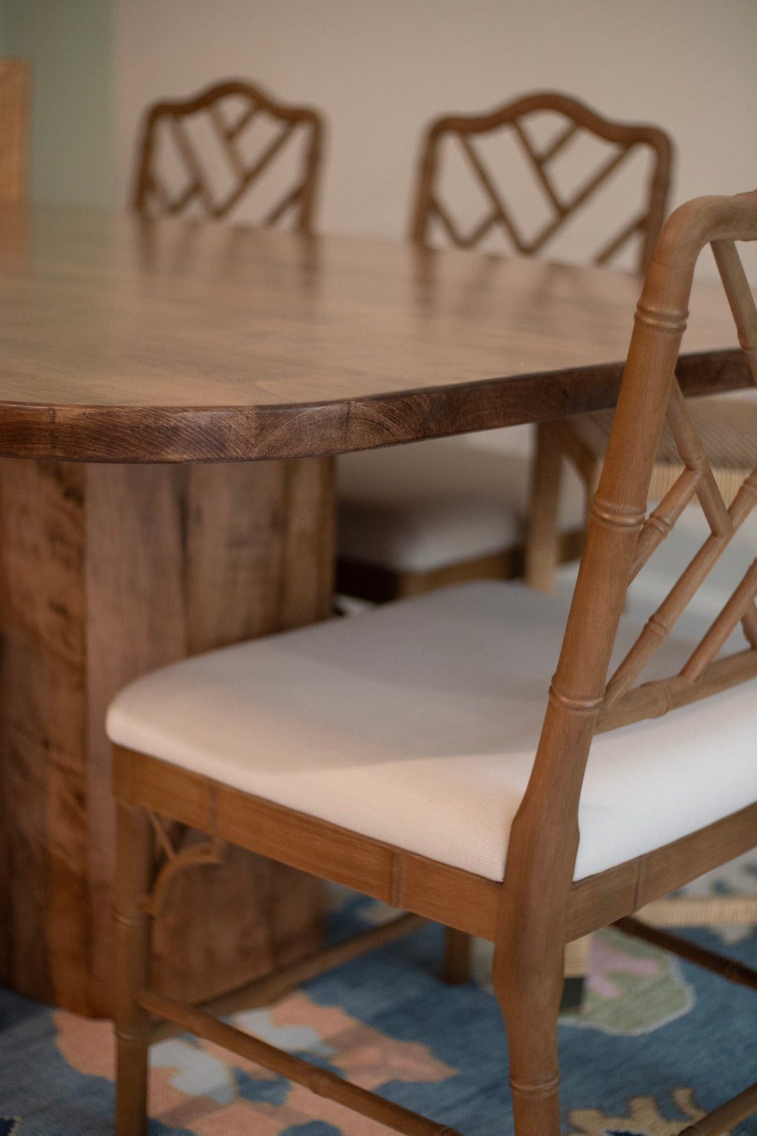 Custom maple dining table with chairs in a room setting