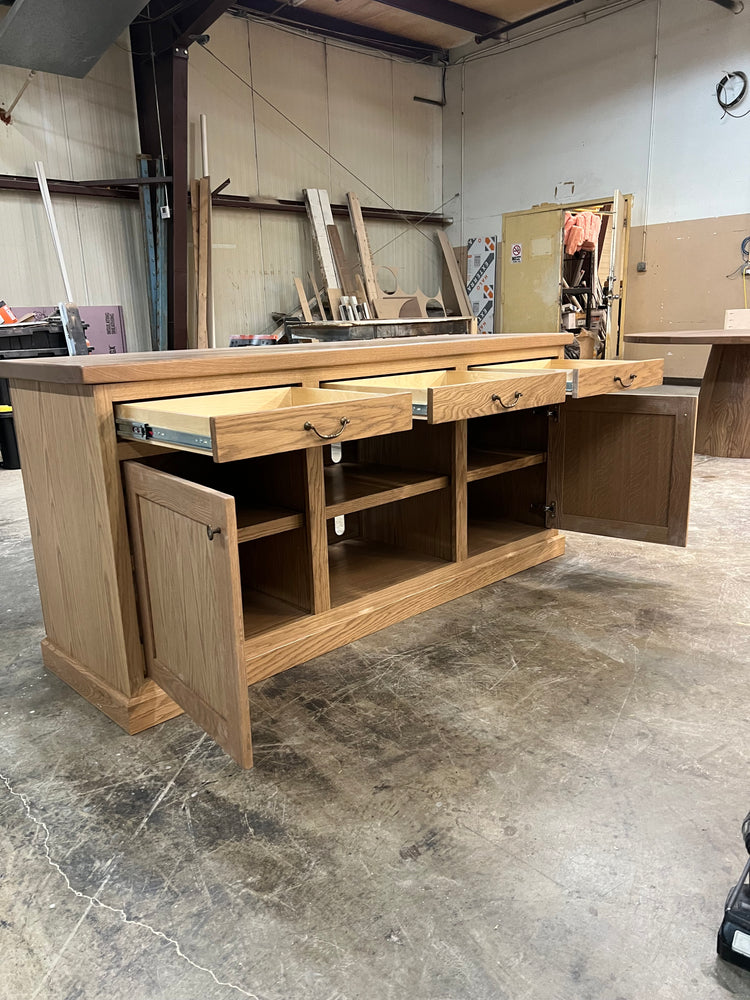 stereo credenza with door and drawers oepn in a workshop